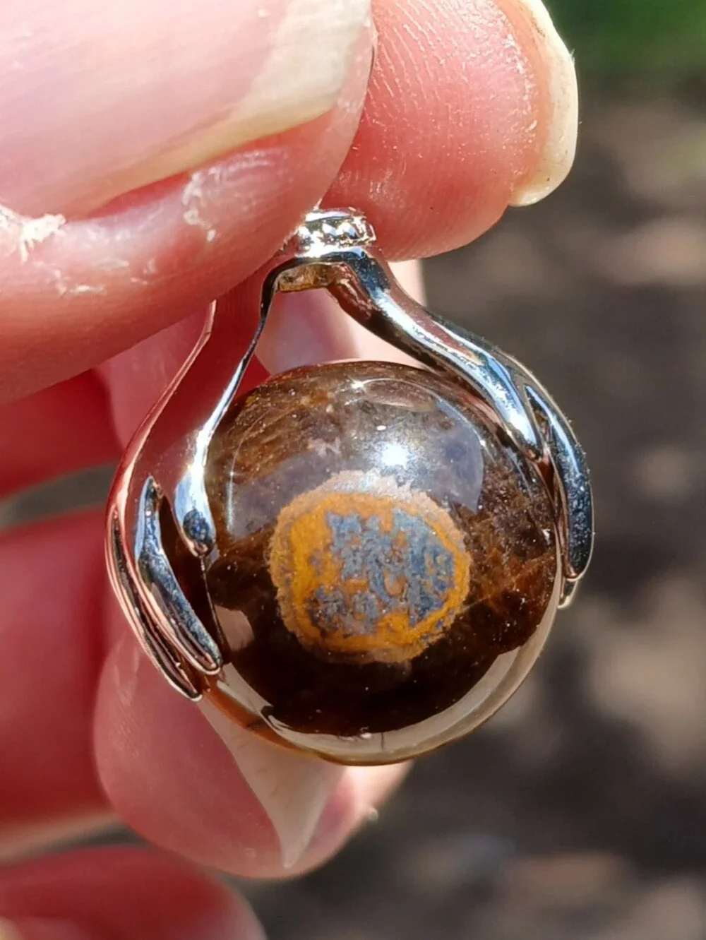 New 18K Hands Holding Tiger Eye Sphere Pendant.